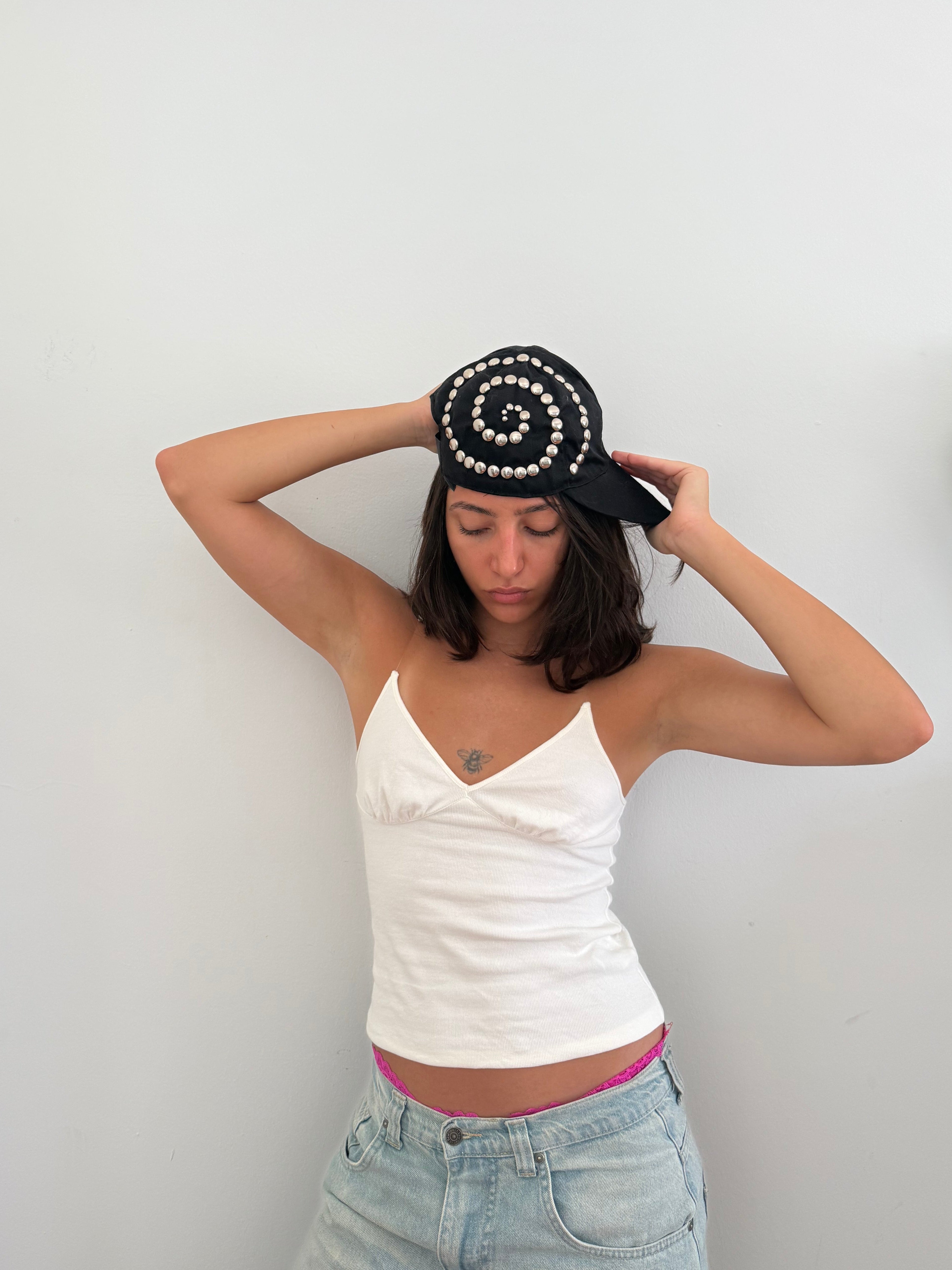 Spiral studded hat
